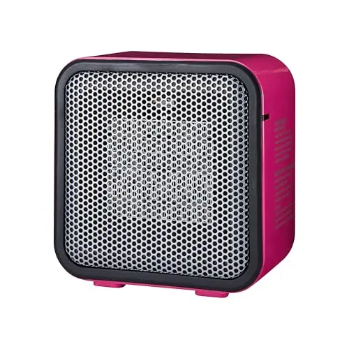 Amazon Basics mini pink heater on office desk
